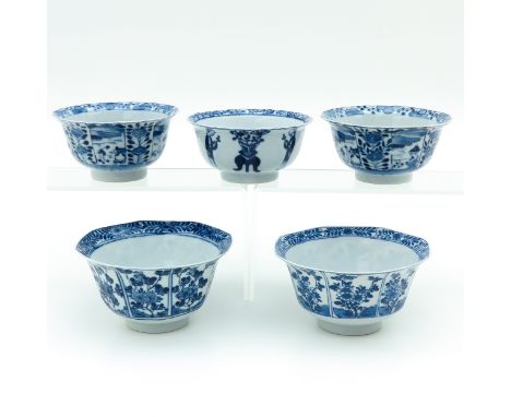 Floral decors, largest bowl is 12 cm. in diameter, including Kangxi mark, chip on rim.
