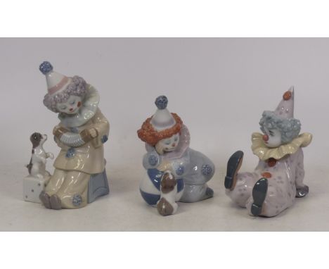 Three Lladro Porcelain Clowns to include Pierrot 'With Concertina', 'Tired Friend' and 'Playing with Puppy'  (14cm H) (3)