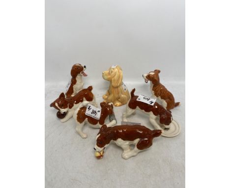 Six Beswick Puppies together with a Sylvac Yellow Seated Puppy (7)