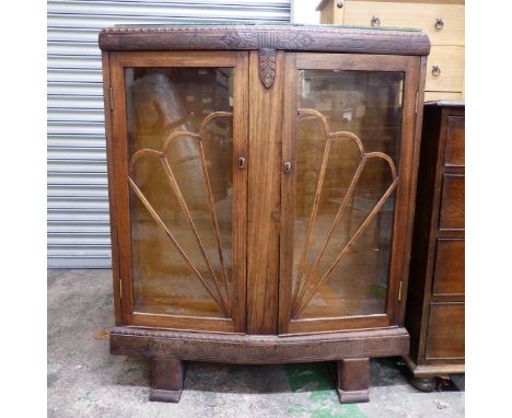 Early 20th Century Art Deco Oak & Glass Display Cabinet with Peacock Fan Pattern Panelling. Internal glass shelves. Height: 1