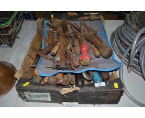 A box of various hand tools 