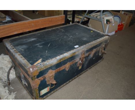 A metal bound travelling trunk 