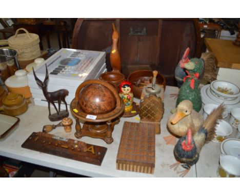 A collection of various wooden ware and ornaments to include a miniature world globe 