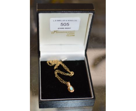 9 CARAT GOLD OPAL EFFECT PENDANT ON 9 CARAT GOLD CHAIN     