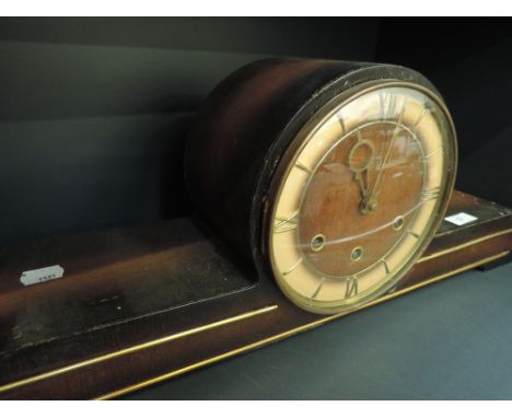 A mid 20th century stylised mantel clock