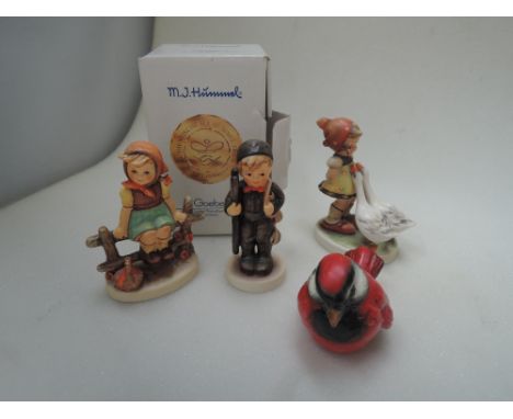 Three Goebel figurines, Chimney Sweep, Goose Girl, Just Resting and a Goebel study, Red Sparrow 