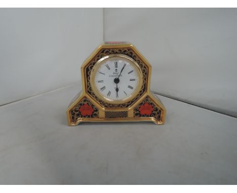 A modern Royal Crown Derby gilt heightened mantel clock in the old Imari pattern