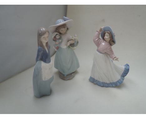 Three Nao figurines, Caught in the Breeze, Constance and It's a Picnic