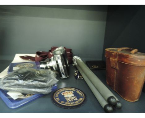 A selection of memorabilia for The Royal Photographer Society including badges, tie, cufflinks and a vintage CMF camera