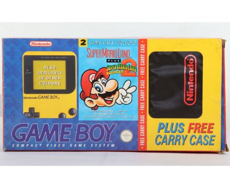Nintendo Game Boy, A boxed Yellow Nintendo Game Boy ‘Compact Video Game System’ Including the Carry Case, and the games Super