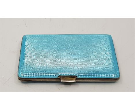 A silver and light blue guilloche enamel cigarette case, import assayed London 1926, with gilt washed interior and in good co