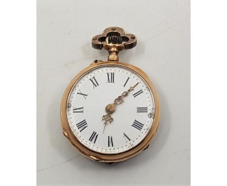 A late 19th century 18ct. gold, diamond and ruby set ladies' open face pocket watch, crown wind, having white enamel Roman nu