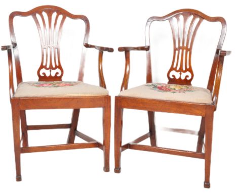 A pair of 18th Century George III mahogany carver armchairs / side accent chairs having a shaped pierced fan backrest splat w