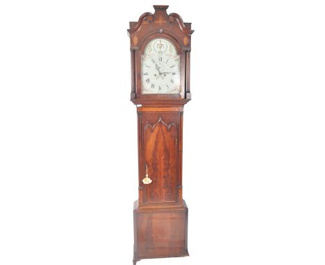 A 19th Century Victorian mahogany longcase grandfather clock having an arched glazed hood housing a hand painted dial with ce