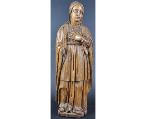 A 18th Century carved walnut religious ecclesiastical devotional figurine depicting Mary the Mother. Hand carved expressional