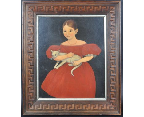 A 19th century oil of board of a portrait painting study of a young girl in a red dress holding a cat. Manner of Ammi Philips