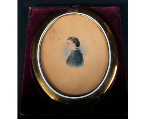 An early 20th Century portrait picture depicting a young lady. Set within large oval frame with brass easel back. The picture