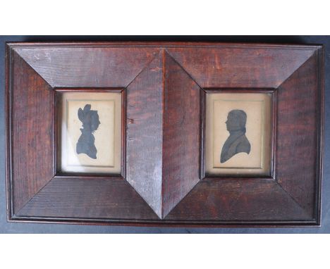 A pair of early 19th Century George III silhouette portrait painting studies depicting a man and woman. Side profiles and fac