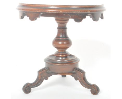 A 19th Century Victorian miniature / salesman / apprentice piece tilt top table having circular carved walnut top inlaid with