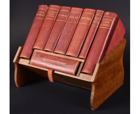A set of early 20th Century leathers bound books set to a hand carved Asprey of London Stand. Makers retailers label to verso