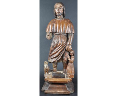 An 18th Century carved oak religious ecclesiastical devotional figurine depicting a holy figure or Saint. The figurine group 