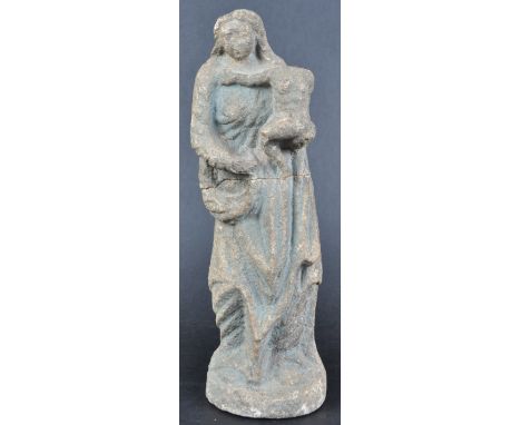 A 19th Century medieval influenced religious ecclesiastical stone carving depicting Mary The Mother holding the Child Christ.