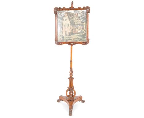 A 19th Century country house Victorian mahogany fireside discretion pole screen. Raised on carved scrolled trefoil support ha