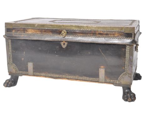 An early 19th Century George III Regency period leather and brass bound campaign travel trunk having brass stud detailing. Hi