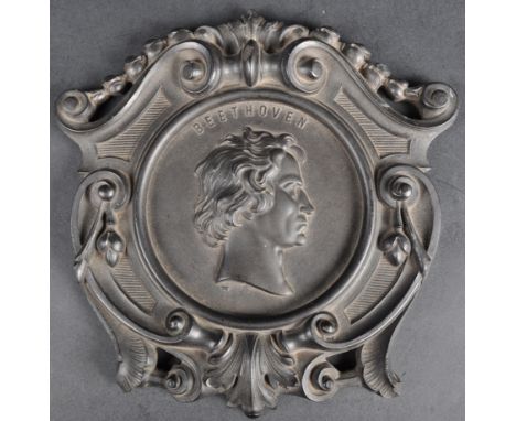 A 19th Century Bois Durci Vulkanite plaque depicting Beethoven. Central relief cameo portrait with Beethoven facing right and