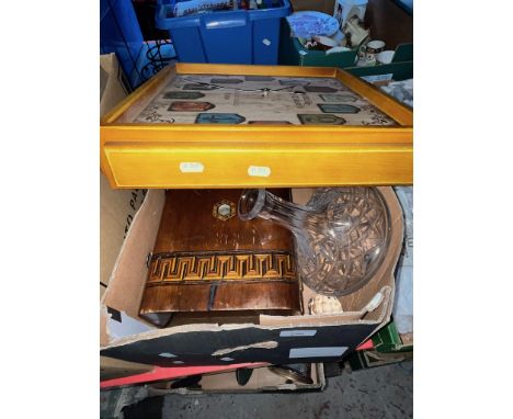 A vintage box, a clock and a ship's decanter. 