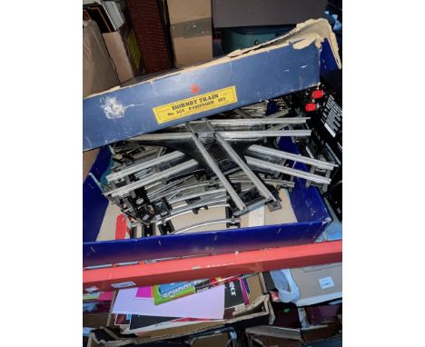 A box of vintage Hornby model railway track. 