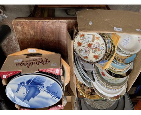 A large ceramic bowl and 2 boxes of collectors plates 