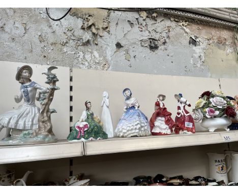 A Nao figure - girl seated with bird on bough; 5 Royal Doulton figurines, and a Royal Doulton bowl of ceramic roses 