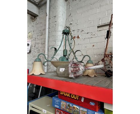 A vintage 3 branch ceiling light fitting and an industrial style lamp. 