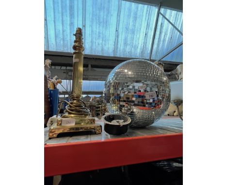 A glitter ball with motor and a brass column table lamp - no shade. 