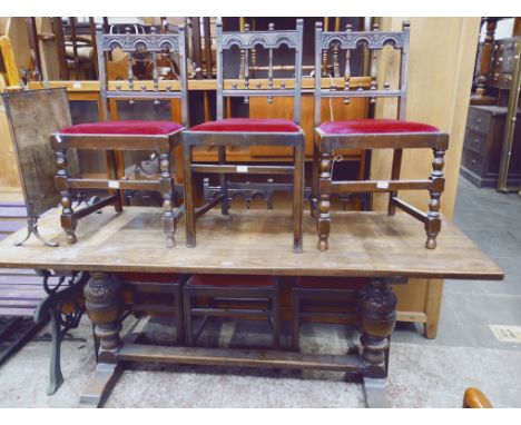 An oak refectory dining table and six chairs, length 190.5cm, together with a mirrored firescreen. 