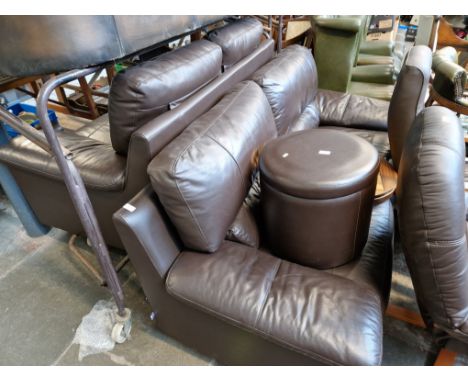 A brown leather three seater sofa and matching two seater sofa together with a pouffe and a chess top table. 