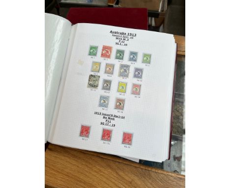 A Trident stamp album Volume I of Australian stamps 1913-1985.P&P:-£22.00+VAT (uk only)