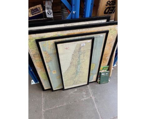 A collection of maps, some framed including Bartholomew's One Inch Map of the Lake District, War Office map of the Isle of Ma