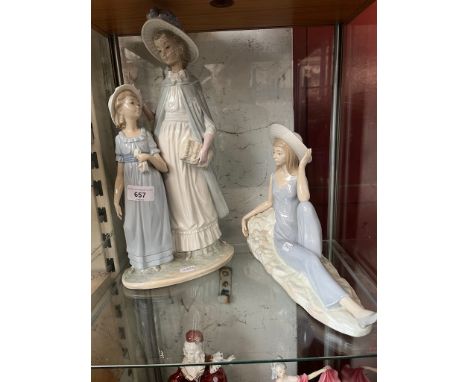 2 large Nao figures - reclining girl wearing straw hat, and mother and daughter 