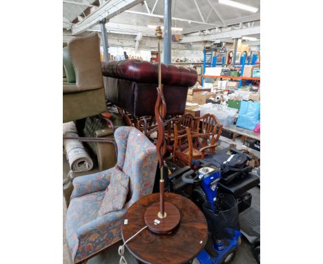 A retro mid 20th century mahogany and brass standard lamp. 