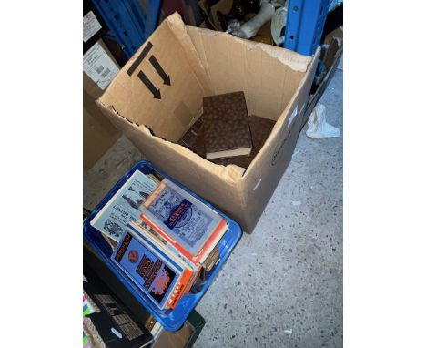 A box of vintage maps and a set of Dickens books. 