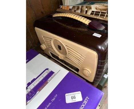 A vintage brown and cream bakelite cased 'Ultra' radio. 