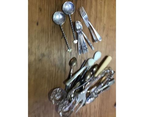A mixed lot of flatware including a set of six inlaid Egyptian white metal coffee spoons, two jam spoons with balls depicting