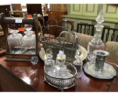 A mixed lot of a wooden tantalus with metal mounts, two decanters (one a/f), together with miscellaneous silver plate ware, a