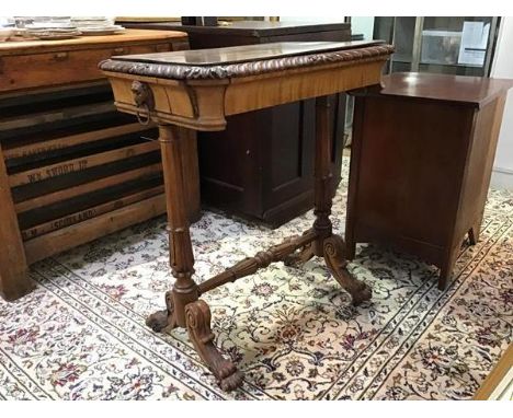 A Scottish Regency mahogany work table c.1820, the rectangular top with gadrooned edge above a pair of side drawers carved wi