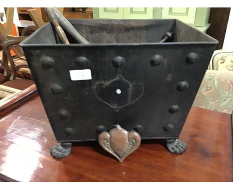 A rectangular tapered steel coal bin with twin handles and cast claw feet together with tools, h28cm x l 38cm x d28cm