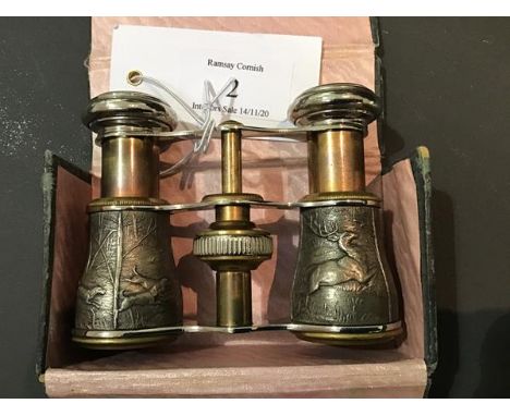 A pair of early 20thc opera glasses, the bodies decorated with hunting scenes, in original box (fully open 9.5 x 7cm)