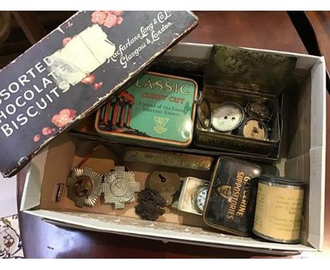 A mixed lot comprising various vintage tins including cigarette tins, miscellaneous other items including cutlery, watch part