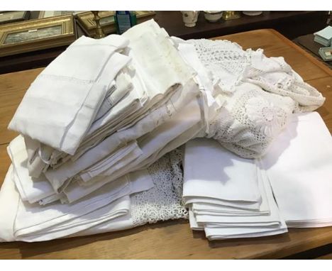 A bag containing a collection of Edwardian drawn thread tea tray and table linen, crochet bordered table and tray cloths, pil